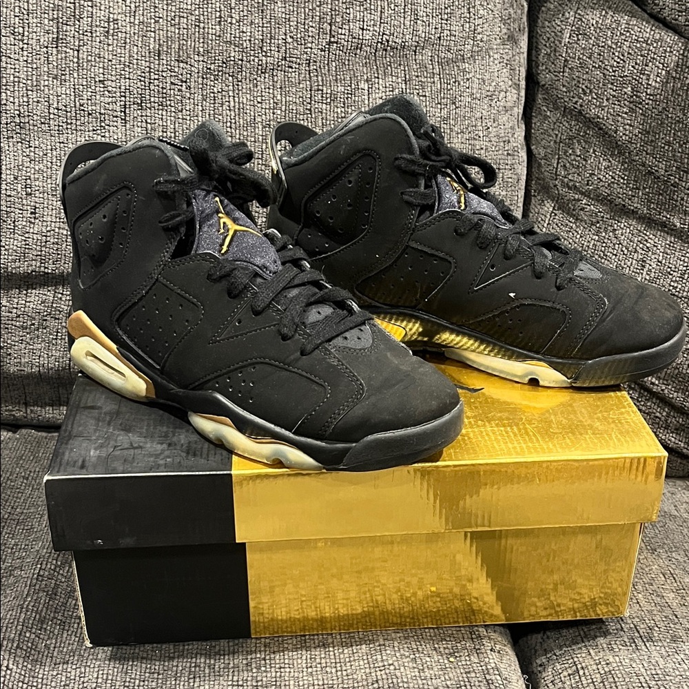 Jordan Black and Gold Sneakers